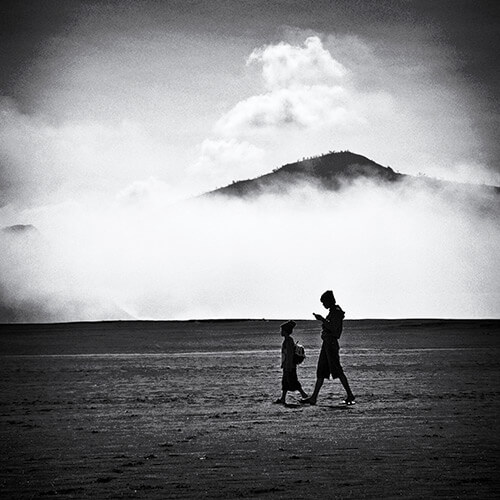2-boys-walking-on-the-plains-of-Mt-Bromo