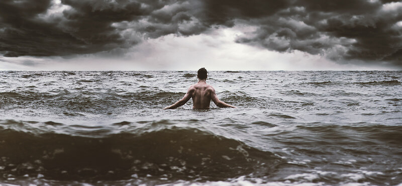 Nate Bittinger man in stormy ocean