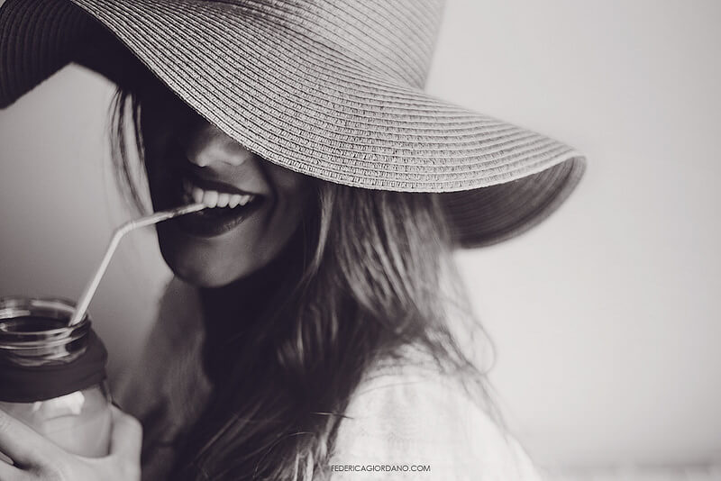 woman in wide brimmed hat