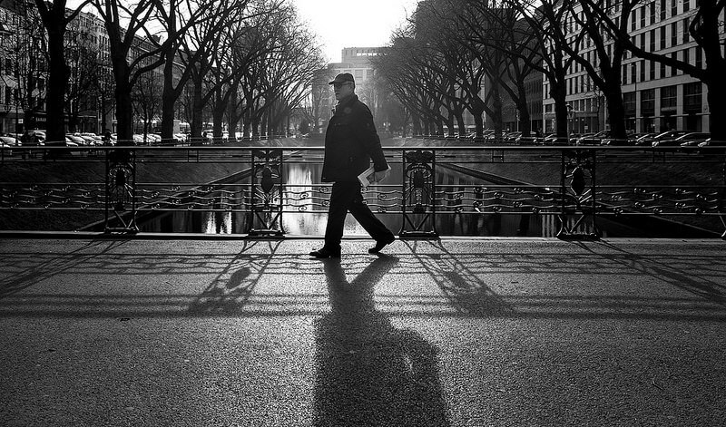 Man walking through Königsallee Düsseldorf