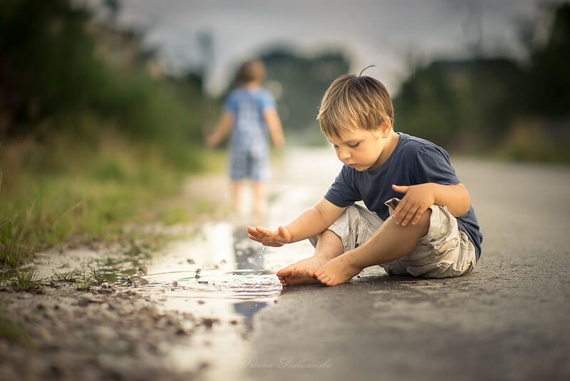 playing in puddle