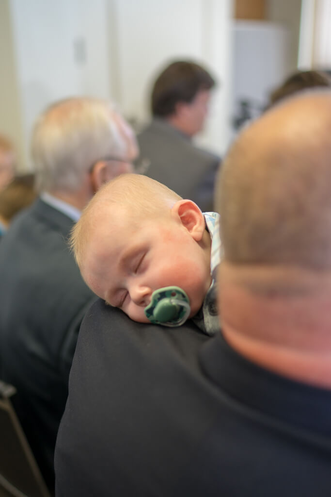 sleeping baby at wedding