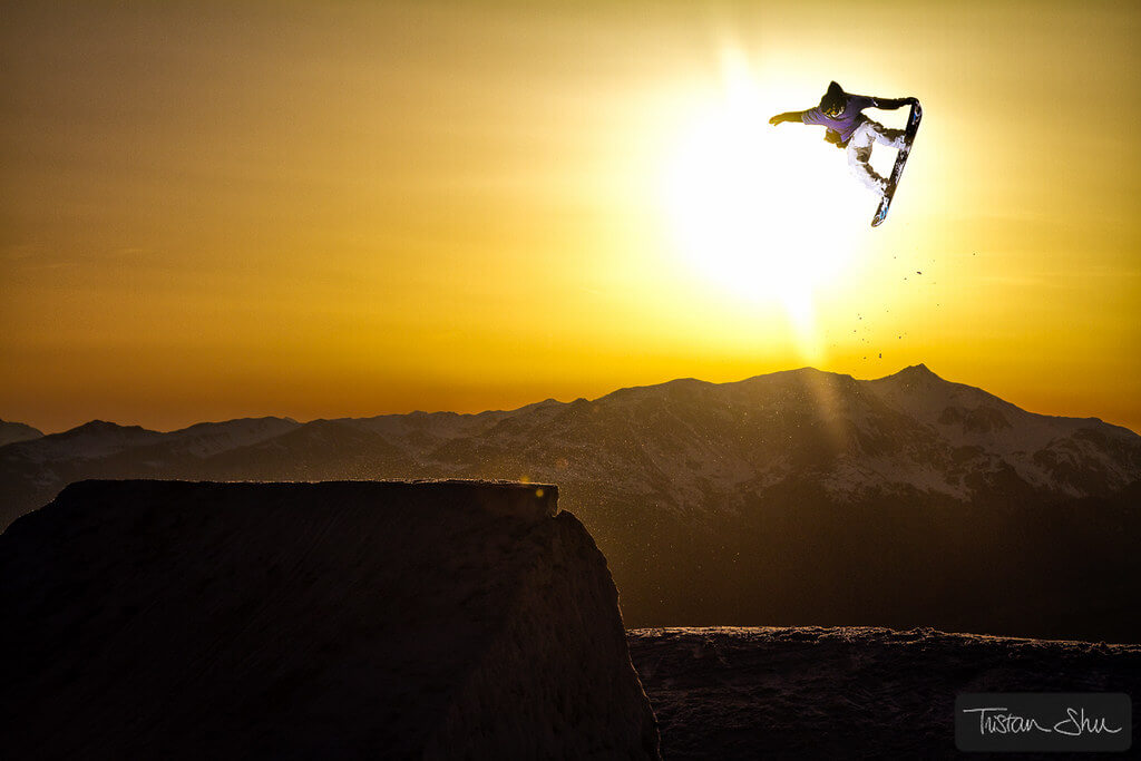 Tristan ‘Shu’ Lebeschu - Tail Grab Snowboarder at Sunset