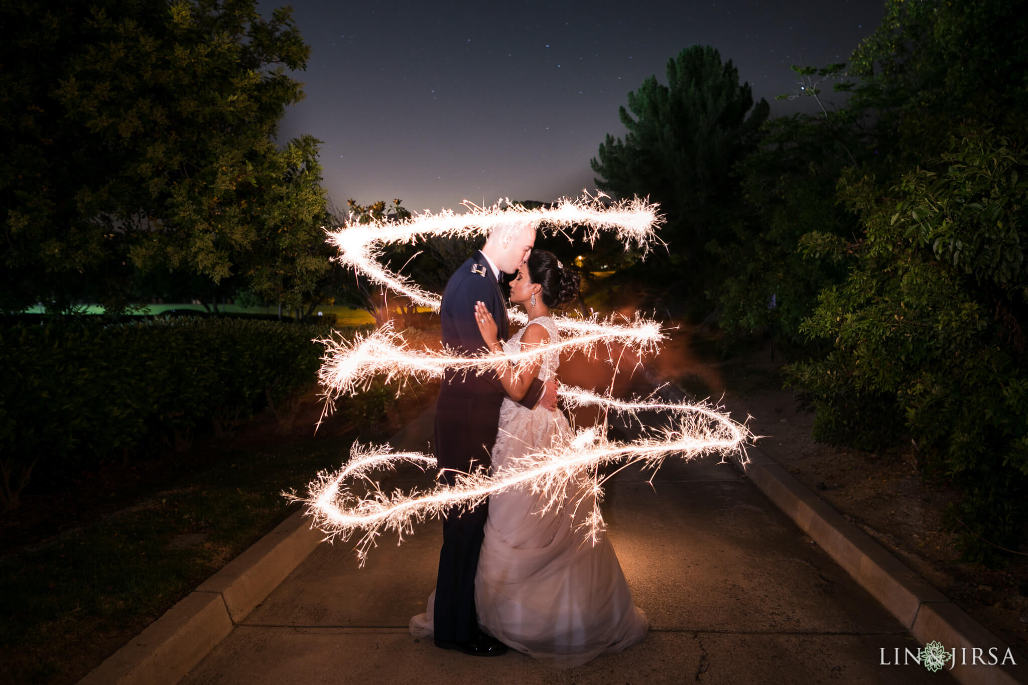 wedding couple with shutter drag sparkler