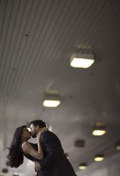 negative space photography couple in the corner