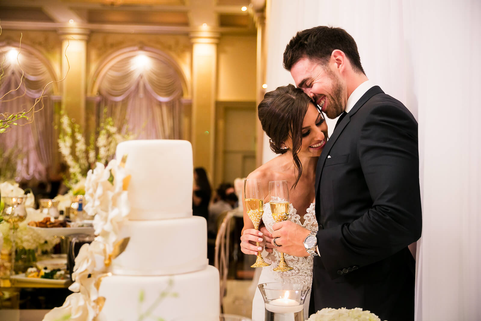 Couple laughs at wedding